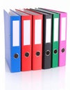 Many bright office folders isolated on white Royalty Free Stock Photo