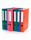 Many bright office folders isolated on white Royalty Free Stock Photo