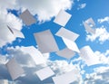 White Papers Flying Freely in a Blue Sky with Clouds Royalty Free Stock Photo