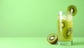 Glass of refreshing drink and cut kiwi on green background, space for text Royalty Free Stock Photo