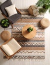 Cozy room interior with stylish furniture and soft carpet with beautiful pattern Royalty Free Stock Photo