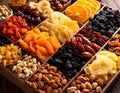 Composition with different dried fruits on wooden background, closeup. Healthy lifest Royalty Free Stock Photo
