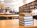 Stack of books on wooden table in library Royalty Free Stock Photo