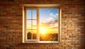 Exposed brick wall with tall window, warm golden sunlight, summer sky Royalty Free Stock Photo