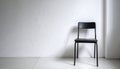Contemporary interior white plaster wall black metal chair minimal design Royalty Free Stock Photo