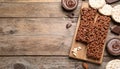 Delicious chocolate puffed rice bars on wooden table, flat lay. Space for text Royalty Free Stock Photo