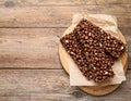 Delicious chocolate puffed rice bars on wooden table, flat lay. Space for text Royalty Free Stock Photo