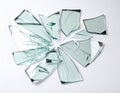 Shards of broken mirror on white background, top view Royalty Free Stock Photo