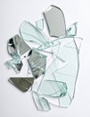 Shards of broken mirror on white background, top view Royalty Free Stock Photo