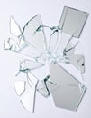 Shards of broken mirror on white background, top view Royalty Free Stock Photo