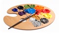 Wooden artist\'s palette with mixed paints and brush isolated on white Royalty Free Stock Photo