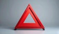 Bold red warning triangle icon on matte gray background centered Royalty Free Stock Photo