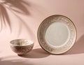 Generated image Vintage-style plates and bowls look aesthetic with soft colors and detailed ornaments. Royalty Free Stock Photo