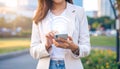 Woman using smartphone with 5G network system outdoors, closeup. Royalty Free Stock Photo