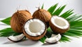 Fresh ripe coconuts with green leaves on white background Royalty Free Stock Photo