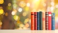 Collection of different books against blurred background, space for text Royalty Free Stock Photo