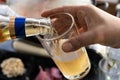 pouring beer into the glass cup Royalty Free Stock Photo