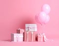 Many gift boxes and balloons near bright pink background Royalty Free Stock Photo