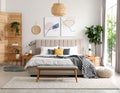 Stylish modern room interior with comfortable double bed Royalty Free Stock Photo