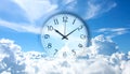 Time concept. Double exposure of blue sky with fluffy clouds and clock Royalty Free Stock Photo
