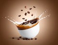 Coffee and milk flow with beans falling into a bowl on a brown gradient background. Royalty Free Stock Photo