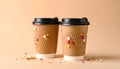 Delicious edible biscuit coffee cups decorated with sprinkles on color background Royalty Free Stock Photo