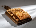 Peanut Sesame Brittle on Wooden Board Royalty Free Stock Photo