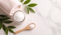 Glass Jar with Bath Salts, Wooden Spoon and Towel Royalty Free Stock Photo
