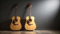 Two Acoustic Guitars Leaning Against a Dark Wall Royalty Free Stock Photo