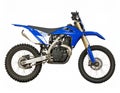 Off-road motorcycle featuring a bright blue body with black accents and a silver exhaust pipe Royalty Free Stock Photo