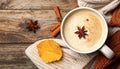 Flat lay composition with cup of hot drink on wooden table. Cozy autumn atmosphere Royalty Free Stock Photo