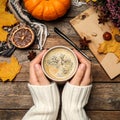 Flat lay composition with cup of hot drink on wooden table. Cozy autumn atmosphere Royalty Free Stock Photo