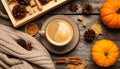 Flat lay composition with cup of hot drink on wooden table. Cozy autumn atmosphere Royalty Free Stock Photo
