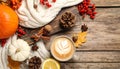 Flat lay composition with cup of hot drink on wooden table. Cozy autumn atmosphere Royalty Free Stock Photo