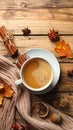Flat lay composition with cup of hot drink on wooden table. Cozy autumn atmosphere Royalty Free Stock Photo
