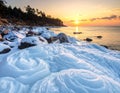 Frozen Rocks by the Sea at Sunset â Winter Landscape Photography Royalty Free Stock Photo