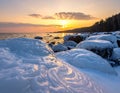 Frozen Rocks by the Sea at Sunset â Winter Landscape Photography Royalty Free Stock Photo