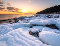 Frozen Rocks by the Sea at Sunset â Winter Landscape Photography Royalty Free Stock Photo