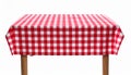 Table with red checkered tablecloth isolated on white Royalty Free Stock Photo