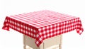 Table with red checkered tablecloth isolated on white Royalty Free Stock Photo