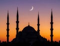 Mosque sunset sky, moon, holy night, islamic night and silhouette mosque, panaromic Royalty Free Stock Photo