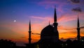 Mosque sunset sky, moon, holy night, islamic night and silhouette mosque, panaromic Royalty Free Stock Photo