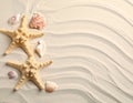 Starfishes and seashells on beach sand with wave pattern, flat lay. Space for text Royalty Free Stock Photo