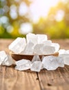 Sugar crystals are arranged on a rustic wooden surface Royalty Free Stock Photo