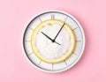 Slaked lime on a clock dial against a pink background. Creative poster Royalty Free Stock Photo