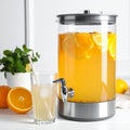 A large glass beverage dispenser filled with orange-infused drink features a metal spigot at the bottom. Royalty Free Stock Photo