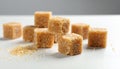 Cubes of brown sugar fill a white ceramic bowl, placed on a white surface. Royalty Free Stock Photo