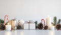 Festive arrangement on a white surface featuring wrapped gifts Royalty Free Stock Photo