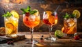 Cocktails are replenished in glasses on the wooden table Royalty Free Stock Photo