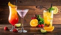 Cocktails are replenished in glasses on the wooden table Royalty Free Stock Photo